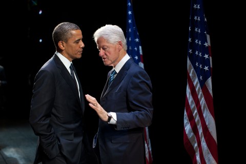 President Barack Obama talks with former President Bill Clinton