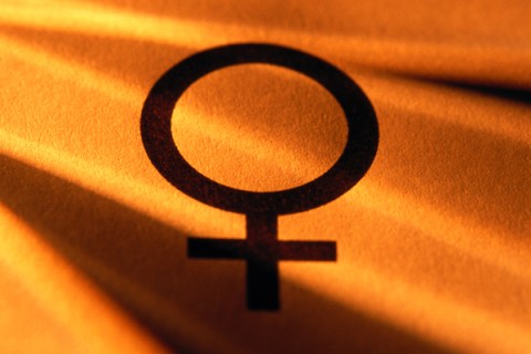 Female Symbol on Orange Background