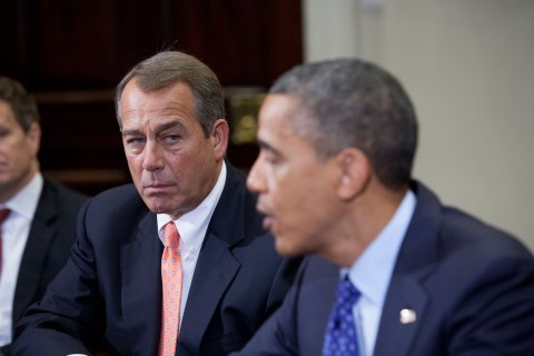image: Speaker John Boehner listens to President Barack Obama speak before a budget meeting at the White House with other cabinet members in Washington, D.C. Nov. 16, 2012.