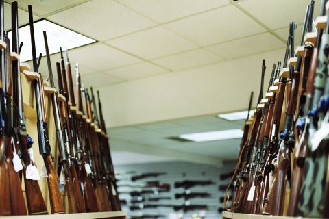 IMAGE: Guns line Wade's Gun Shop in Bellevue, Wash.