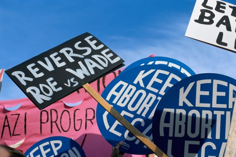 Signs For and Against Abortion Rights