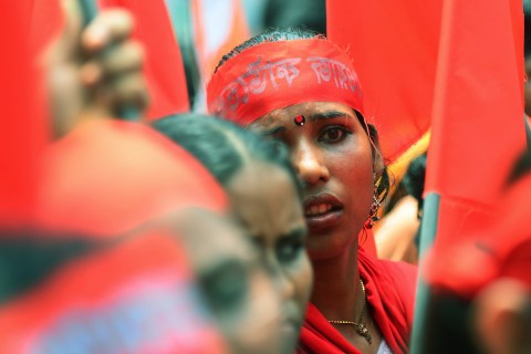 Bangladeshi activists at a procession to mark May Day or International Workers Day in Dhaka on May 1, 2013.