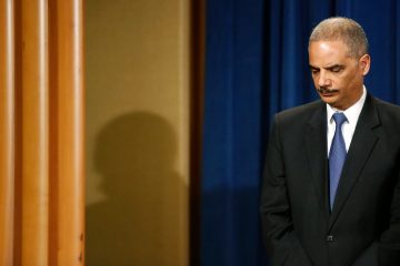 Attorney General Eric Holder attends a news conference at the Justice Department in Washington, D.C., on May 14, 2013.