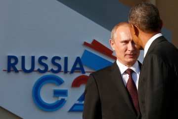 From left: Russian President Vladimir Putin welcomes U.S. President Barack Obama before the first working session of the G20 Summit in Constantine Palace in Strelna near St. Petersburg, on Sept. 5, 2013.