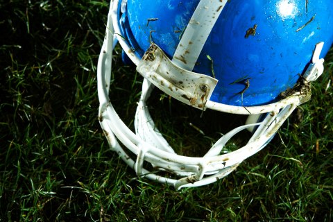 Football helmet on grass