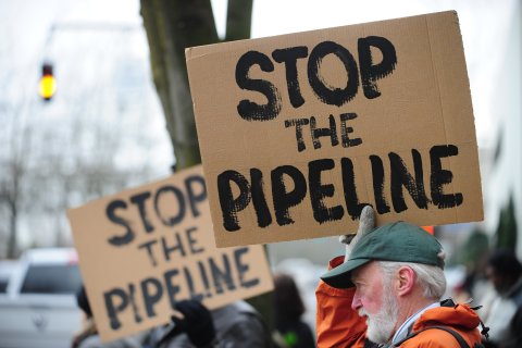 Protesters demonstrate against TransCanada in Portland on the opening day of the southern leg of the Keystone Pipeline, on Jan. 22, 2014.